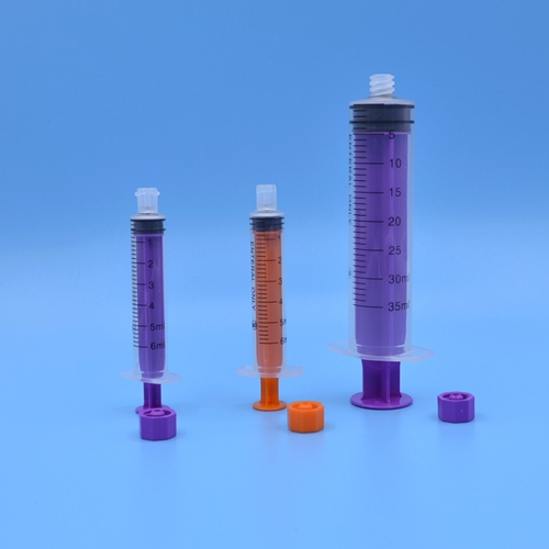 Disposable feeding tube syringe